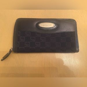 St John black monogram zip wallet